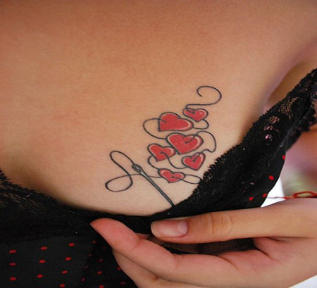 Rose Tattoos on Breast small chest tattoos
