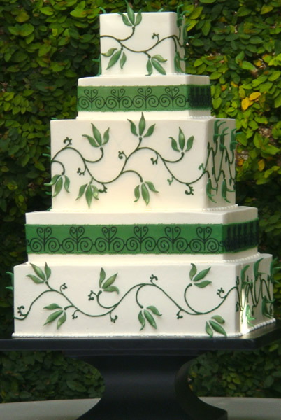 Stunning green wedding cakes created by Wedding Cakes by Jim Smeal in