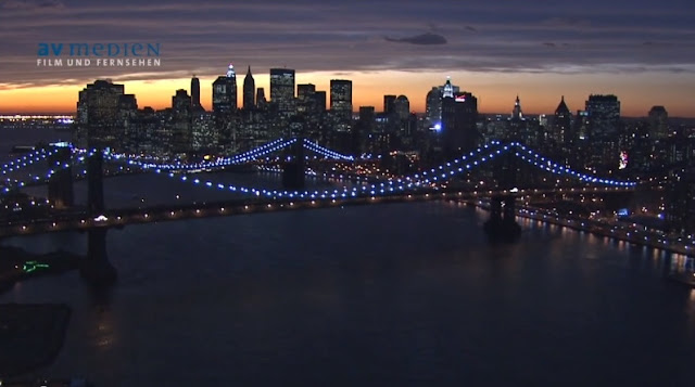 Photo of Manhattan bridge and Brooklyn Bridge at sunset
