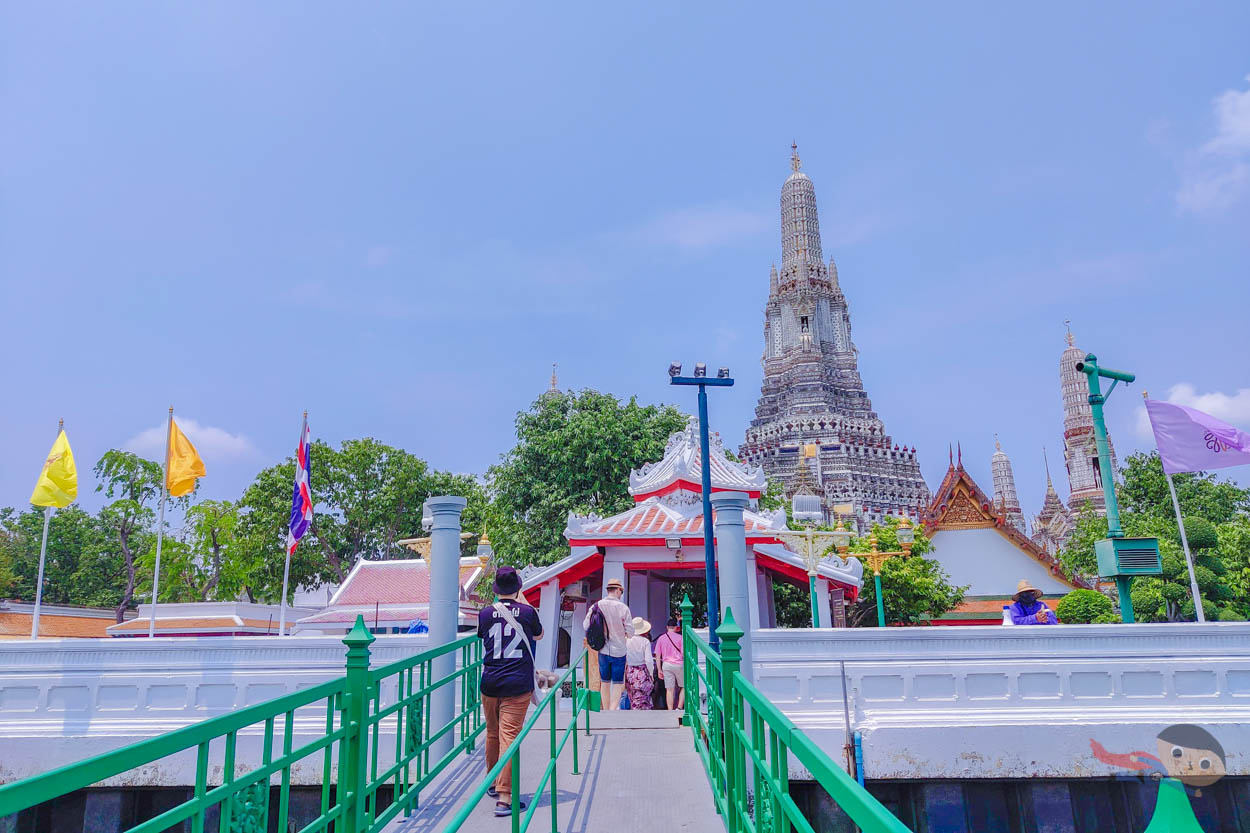 Walking toward the entrance of Wat Arun Temple from the pier