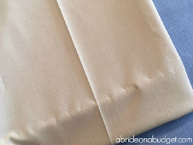 If your dress pants are a little long, you'll want to hem them. Find out how to blind hem your dress pants for a wedding in this post from www.abrideonabudget.com.