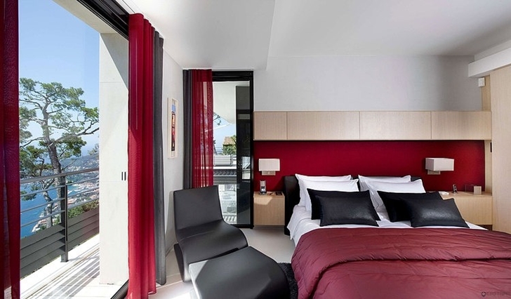 Red bedroom in Modern Bayview Villa In French Riviera