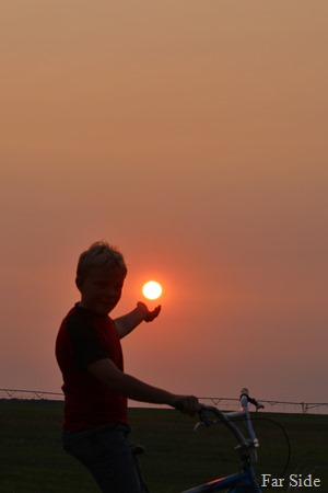 Mason holding the sun