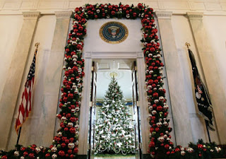 A holiday Christmas tree in the Blue Room of the White House