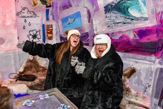 Two women in fur coats and winter hats at the Minus5 Ice Bar in Las Vegas