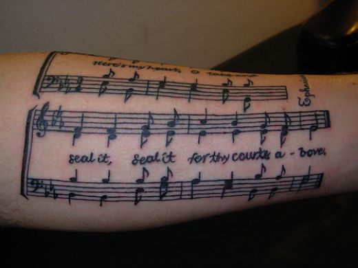 music tattoos. song tattooed on yer arm,