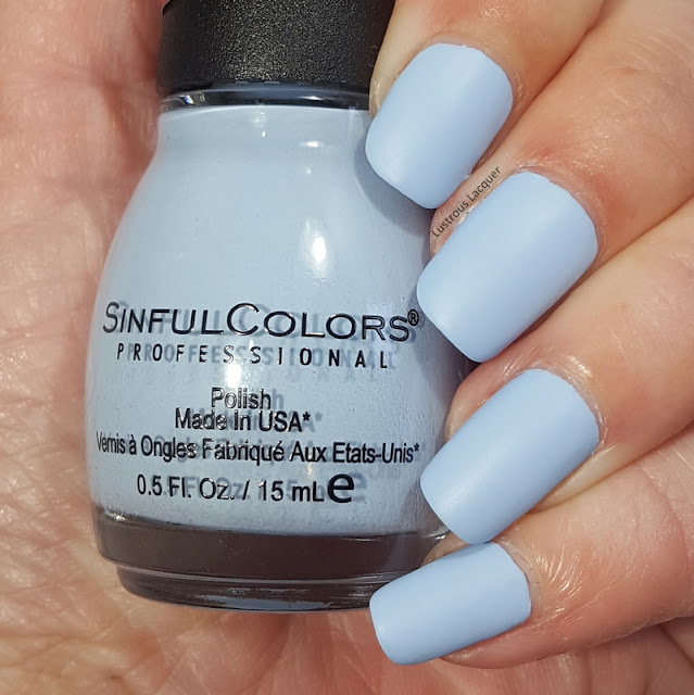 Pale blue colored nail polish with a matte finish