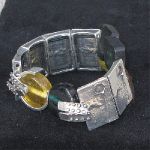 green acrylic and pewter link bracelet