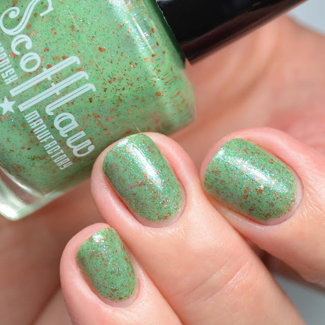 green nail polish with shimmer swatch