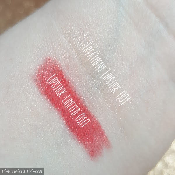 labelled swatches on arm of Paul & Joe Lipstick Limited 010 and Treatment Lipstick 001