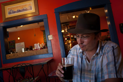 Jeremy Wade Shockley enjoys a cold beer at the Avalanche Coffee House and Bakery in Silverton, CO.