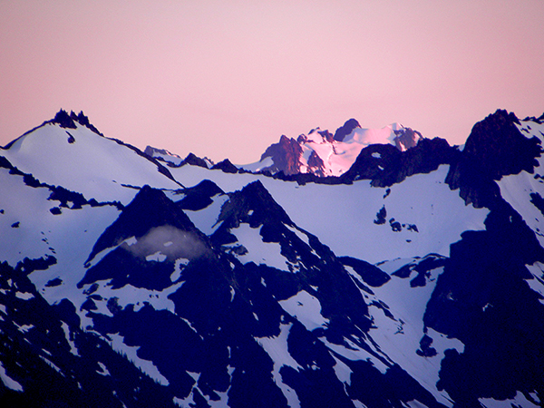 Dark Mountains and Snow with Pink Sunset on Mt. Olympus Blue Glacier