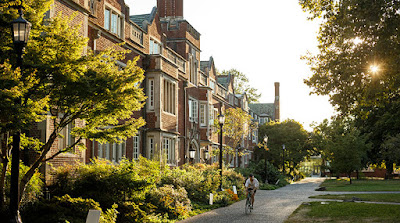 A student cycling in Reed College