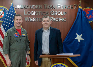 Rear Adm. Mark Melson, Commander, Logistics Group Western Pacific/Task Force 73, left, and Dr. Glendon Diehl, take time for a photo during a visit to COMLOG WESTPAC/CTF 73 in Singapore, Feb. 13. (U.S. Navy photo by Mass Communication Specialist 1st Class Brandon Parker/Released)