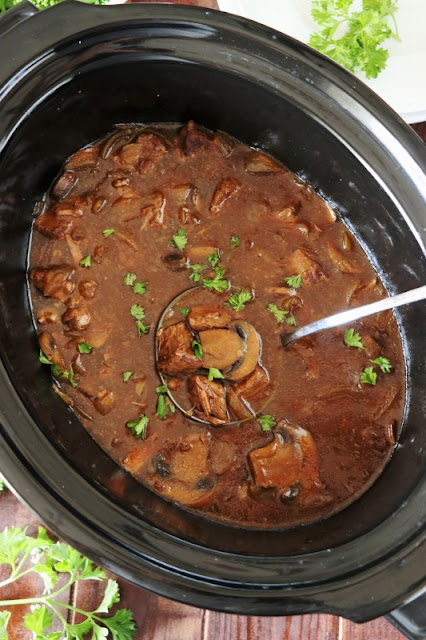 Making beef tips in the crockpot image