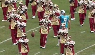 Graham Gano practices FGs surrounded by marching band