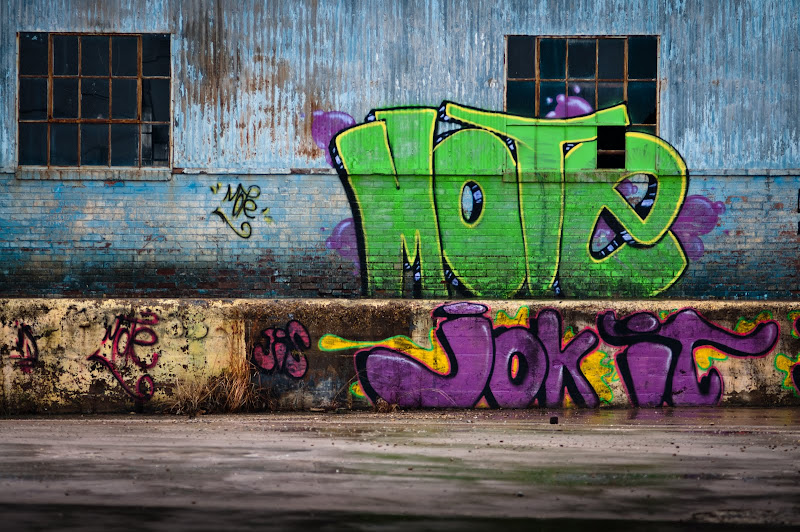 photo of green and purple graffiti