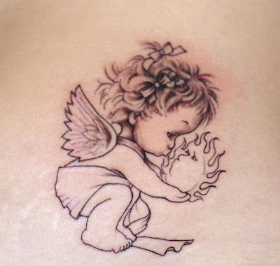 Baby angel tattoo Baby angel tattoo Small baby angel tattoo kissing the