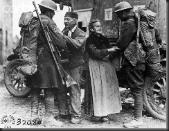 couple greets soldiers