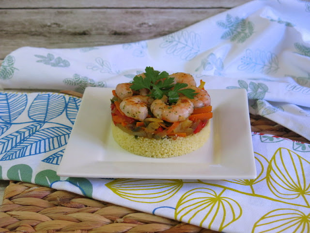 TIMBAL DE COUS COUS CON VERDURAS Y LANGOSTINOS