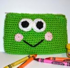 http://www.craftsy.com/pattern/crocheting/accessory/frog-amigurumi-pouch/5823