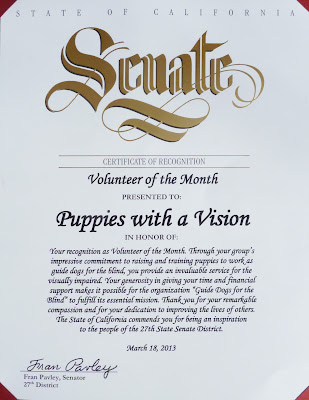 Puppies with a Vision certificate of recognition from State Senator Fran Pavley