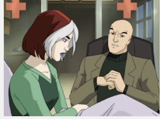 Rogue, a young woman with red hair and a white streak in it, sitting up in her hospital bed. Beside her, Charles Xavier is seated, his hands resting in front of him.