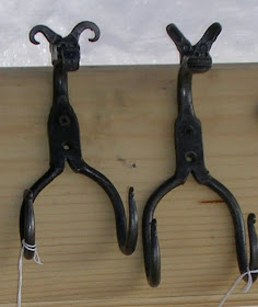 hooks with animal faces, made by blacksmith