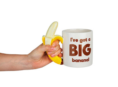 Big Banana Coffee Mug With Winking Monkey Graphic At The Bottom Of The Mug