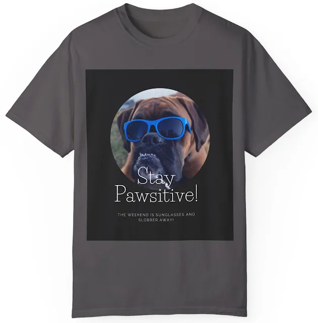 T-Shirt With Close Up Face of Boxer Dog Wearing Blue Glasses and Caption Stay Pawsitive, The Weekend is Sunglasses and Slobber Away!