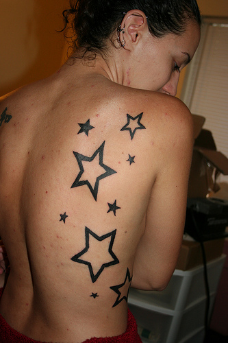 pretty star and flower tattoos