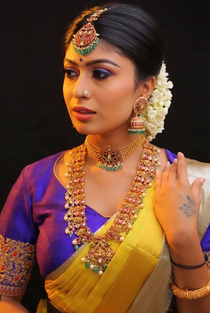 Bride in Jumbo Jhumkas Maang Tikka