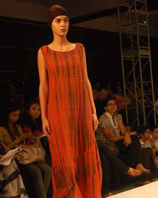 A model displays a creation by designer Kallol Datta during the Day 2 of 'Kolkata Fashion week II' on September 10, 2009.