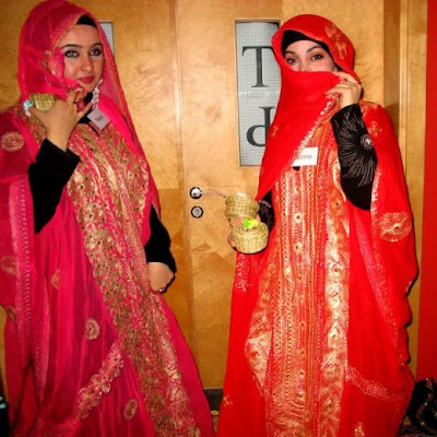 Saudi Arabia Women in Red Dress