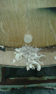 A standard Belgian cork is inserted into the hole