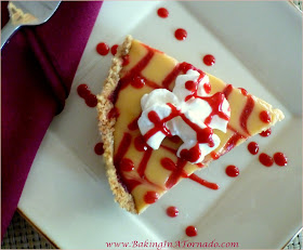 Berry Key Lime Pie in a Nut Crust, the classic Key Lime pie kicked up a notch with the addition of a berry swirl and served in a walnut crust | Recipe developed by www.BakingInATornado.com | #recipe #pie