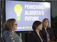 From left, Deputy Premier Sarah Hoffman, Shannon Phillips is the Minister of Environment and Parks and the Minister Responsible for the Climate Change Office.and Marg McCuaig-Boyd, Energy Minister. The Alberta government outlined their plan to move away from coal fired electricity at the Federal Building in Edmonton on November 24, 2016. Photo by Shaughn Butts / Postmedia Stuart Thomson Story For a Stuart Thomson/CP story running in the Sun and Journal. (Credit: Shaughn Butts / Edmonton Journal) Click to Enlarge.