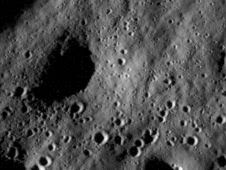 This image shows cratered regions near the moon's Mare Nubium region