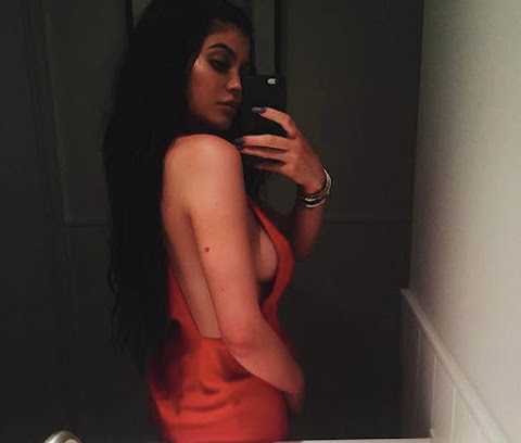 Kylie Jenner Gets New Red Hip Ink