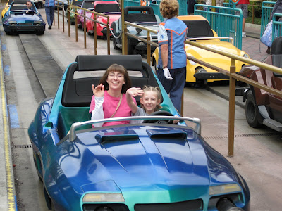 Mommy and Mandi in their Autopia car