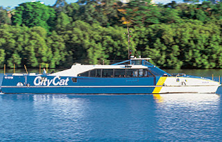 picture of blue yellow and white citycat ferry on brisbane river