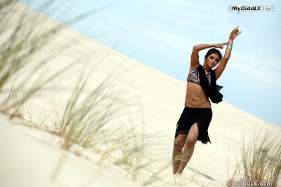 Neetu Chandra in a Bikini Top in a Desert image