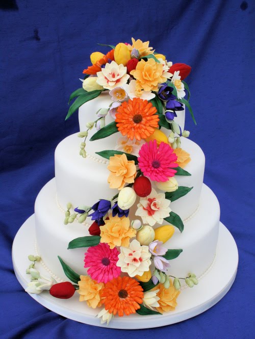 Our vibrantly coloured'Spring Wedding Cake' seems to have finally heralded