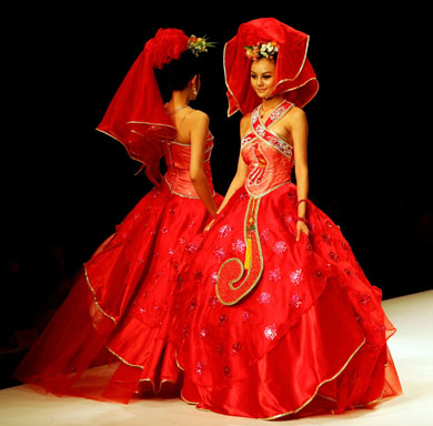 Brides wear a red wedding gown it's considered the classic wedding dress
