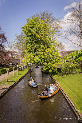 Can you imagine a village with no roads? There is such a place in the Netherlands called Giethoorn (pronounced 'geethorn'). There are no roads and cars have to remain outside the village. The only access to the stunningly lovely houses in Giethoorn is by water, or on foot over tiny individual wooden bridges.