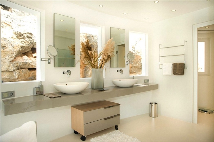 Two sink bathroom in Mediterranean villa in Mallorca by Alberto Rubio