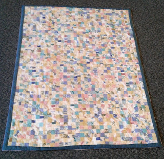Postage stamp quilt from re purposed material