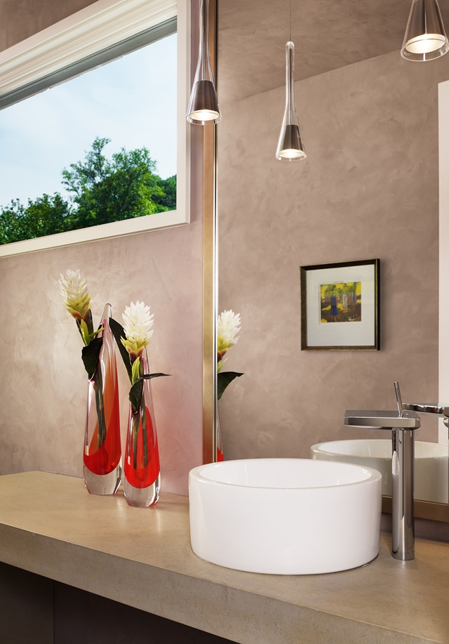 Photo of modern white round sink in the bathroom of an amazing house on the hill