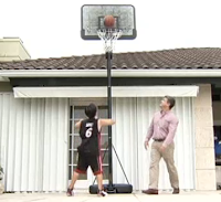 Jack Meyer shooting hoops with his father