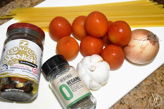 Zaragoza Spanish Style Sardines, Heritage Oregano, Garlic, White Onion, Tomatoes, Linguine